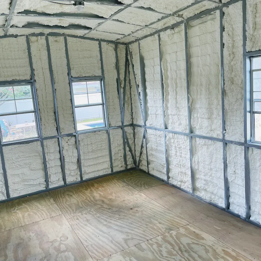 Closed-cell spray foam insulation applied to wall cavities in a residential project in North Versailles